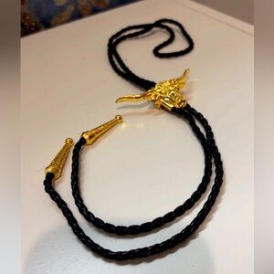Gold and Black Bull Head Bolo Tie
